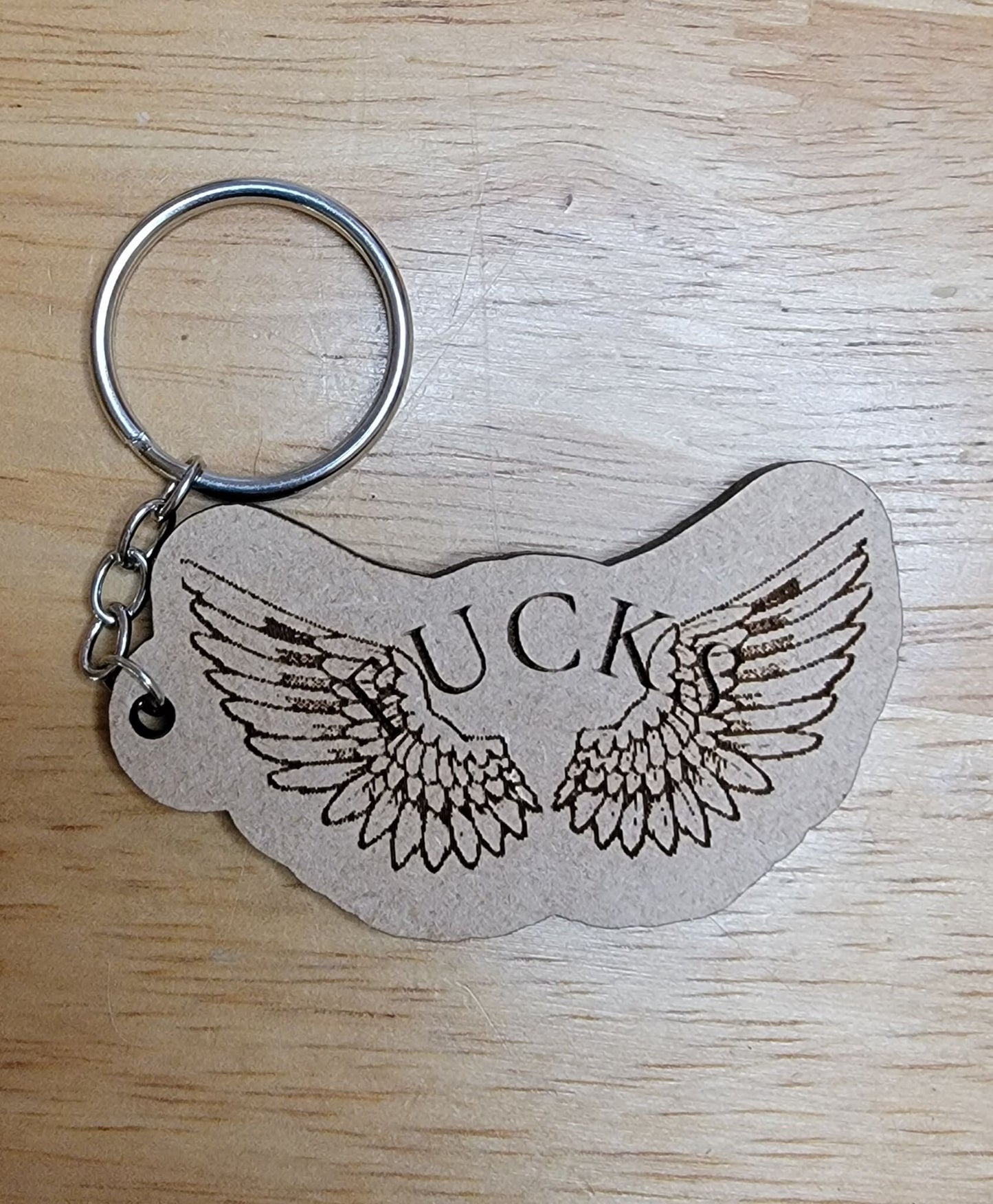 Flying f*c*s keychain