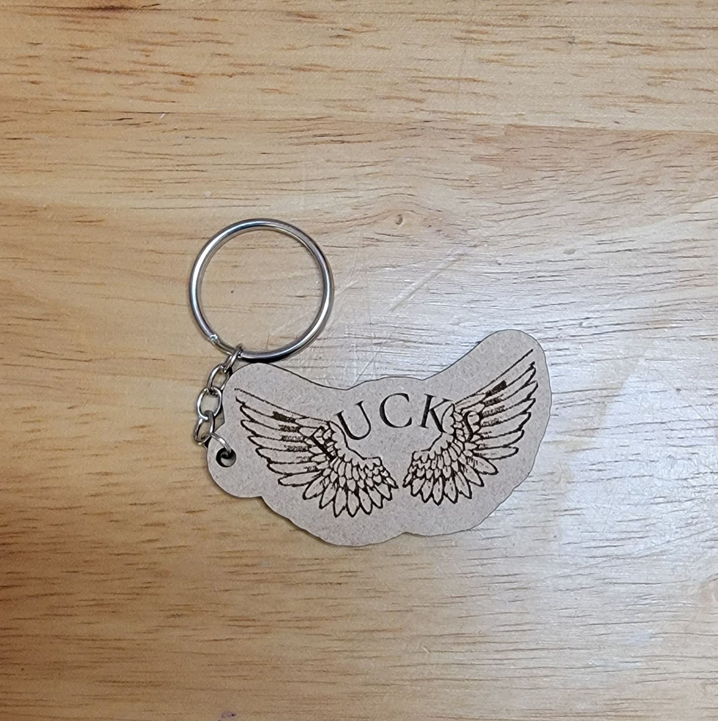 Flying f*c*s keychain